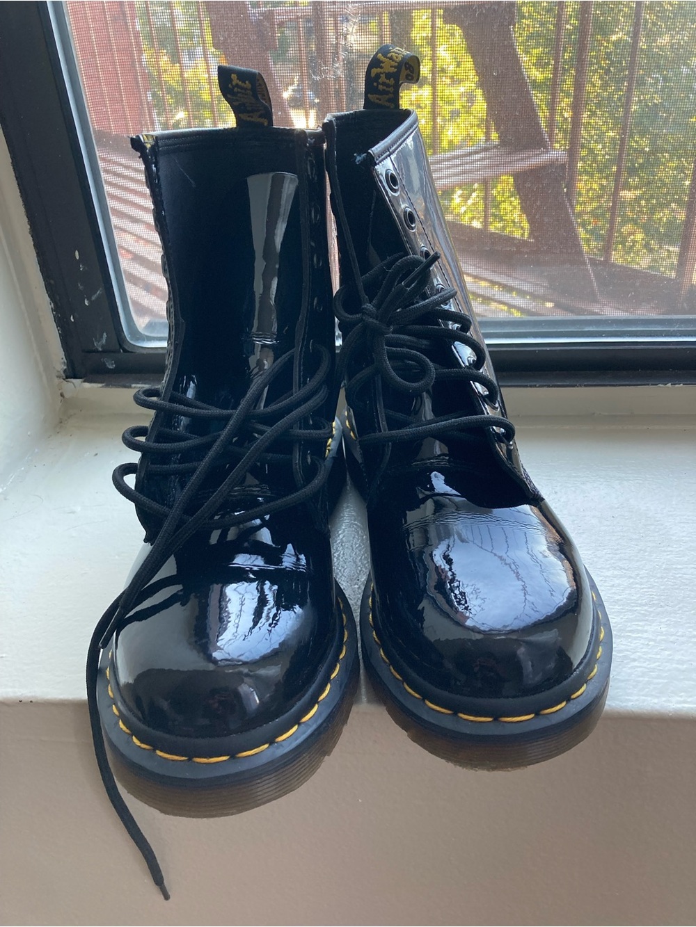Dr. Martens Black Patent Combat Boots with Yellow Stitching